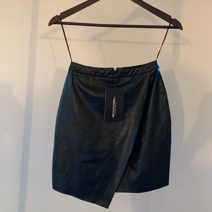Black faux leather wrap mini skirt